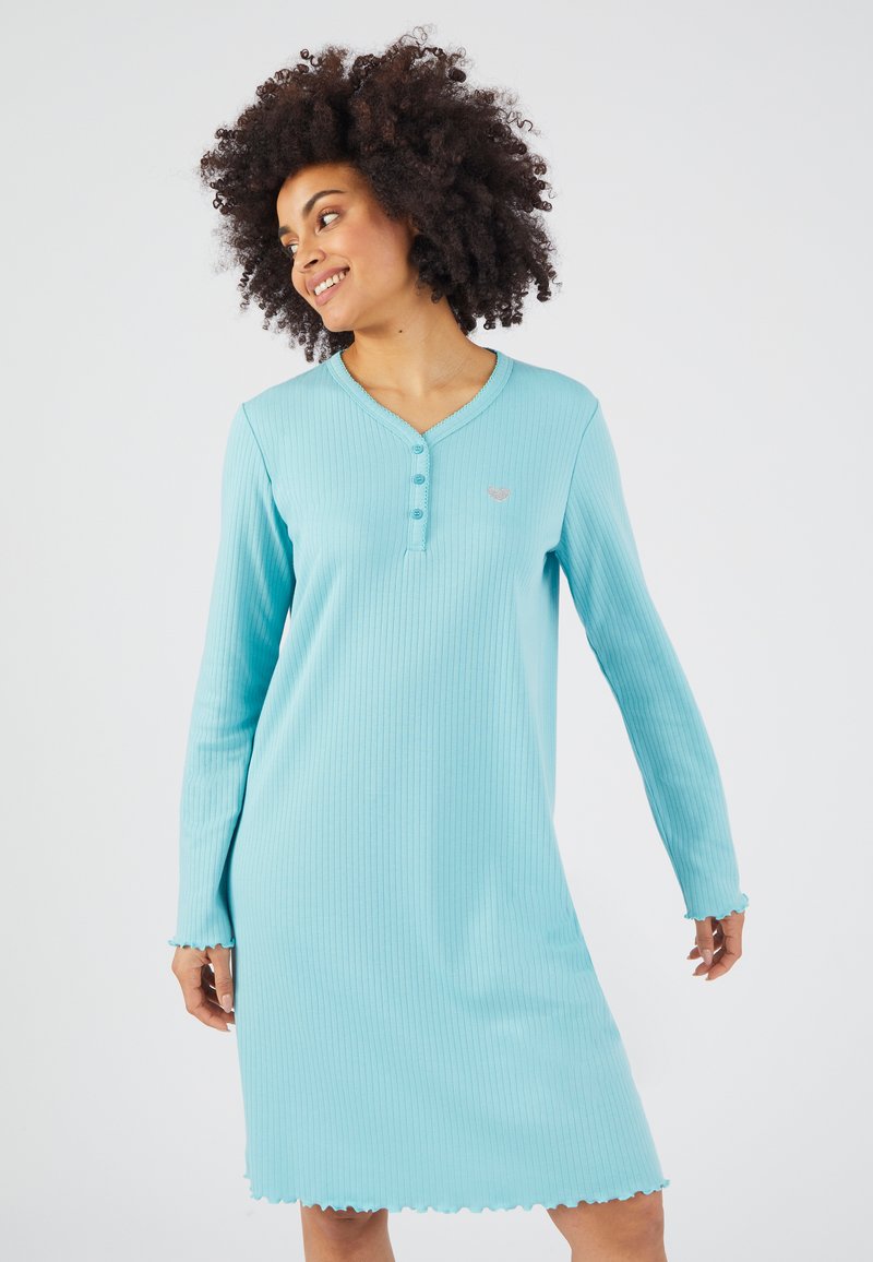 Robe bleu clair à manches longues en coton côtelé avec un ourlet festonné, dotée d'un col henley et de trois boutons, fabriquée à partir d'un tissu doux.