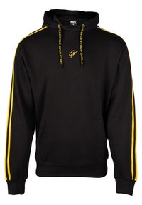 Zwarte hoodie met gele zijstrepen en koordjes. Voorzien van een voorzak en een logo op de borst. Gemaakt van zachte stof.