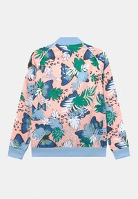 Floral bomber jacket with a pastel pink background, featuring blue and green butterfly and leaf patterns. Long sleeves with a light blue collar.