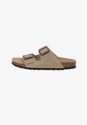 Beige open-toe sandal with two adjustable straps, brown buckles, cork footbed, and black textured sole.