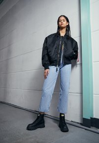 Buffalo Bottines à plateau - black