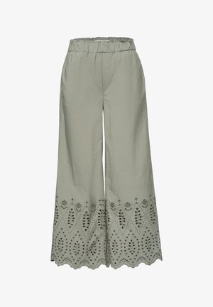 Pantalon large vert clair avec taille élastique et motifs floraux brodés en œillets le long de l'ourlet festonné.