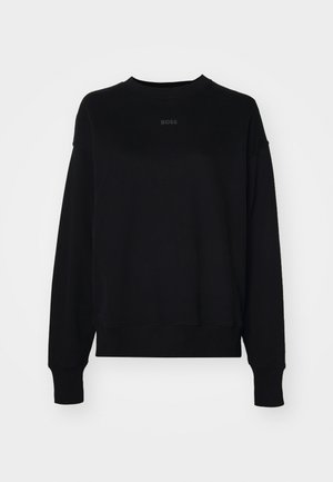 Čierna mikina vyrobená z kombinácie bavlny, s dlhými rukávmi, okrúhlym výstrihom a subtilným logom v strede. Klasický strih s rebrovanými manžetami.