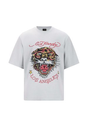 T-shirt en coton gris à manches courtes avec un graphique de tigre coloré, le texte "Ed Hardy" et des étoiles aux accents rouges et jaunes.