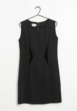 Schwarzes ärmelloses Kleid mit einer figurbetonten Passform, kontrastierenden samtigen Seiteneinsätzen und rundem Ausschnitt. Reißverschluss hinten.