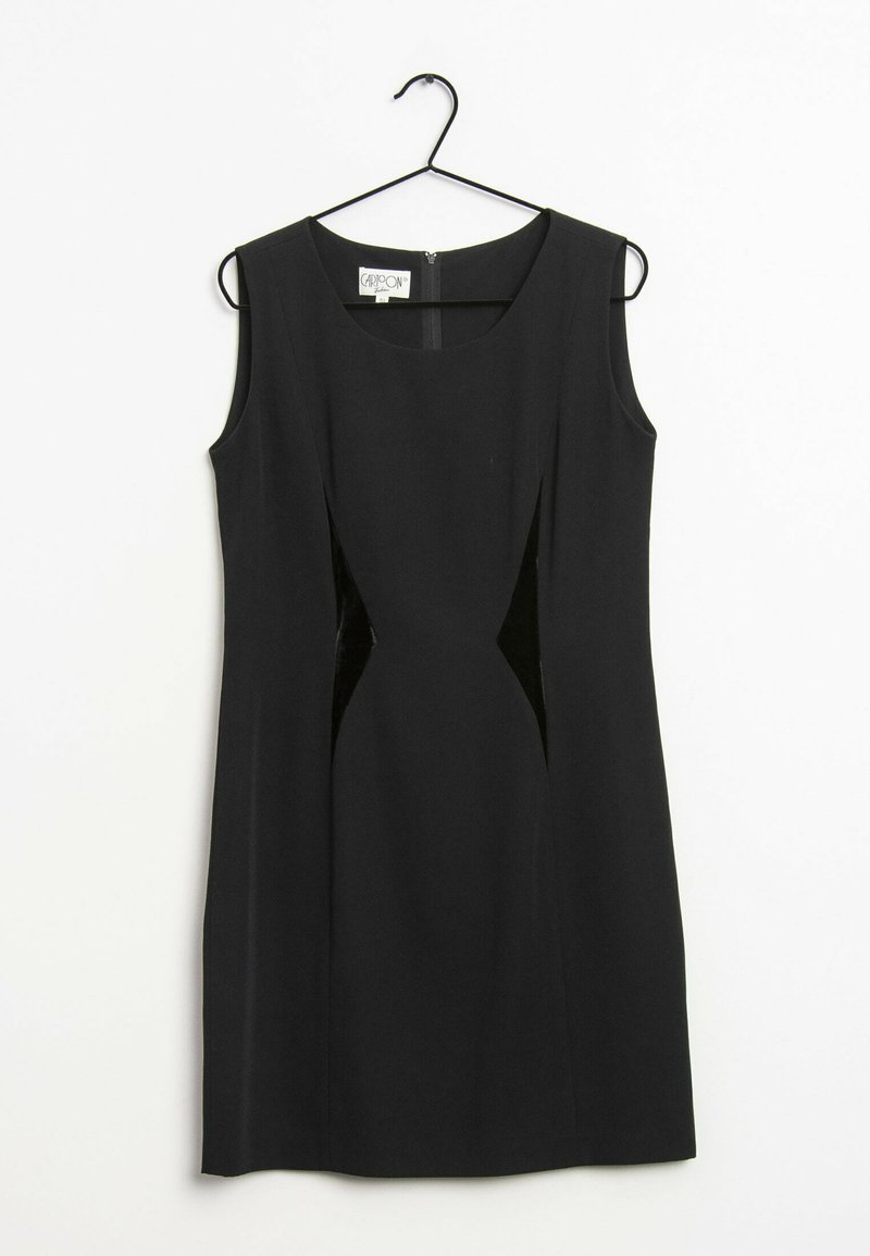 Černé bezramínkové šaty s přiléhavým střihem, obohacené kontrastními sametovými bočními panely a kulatým výstřihem. Zapínání na zip na zadní straně.
