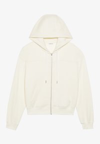 Fehér, cipzáras kapucnis sweatshirt, nagy kapucnival, elől zsebekkel és húzózsinóros zárással. Puha anyagból készült, bordázott mandzsettákkal és alsó résszel.
