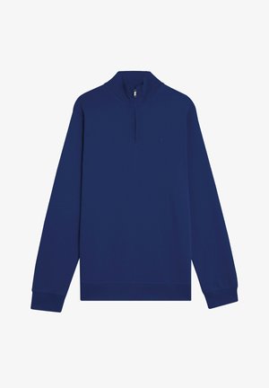 Temno modra majica z dolgimi rokavi in zadrgo do polovice, rebrastimi robovi na manšetah in spodnjem robu. Ima vezen logotip, gladko teksturo in minimalističen dizajn.