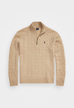 Beige kabelstrikket sweater med kvart lynlås krave, ribbede kanter og ærmer, med et lille logo på brystet. Blødt, struktureret stof.