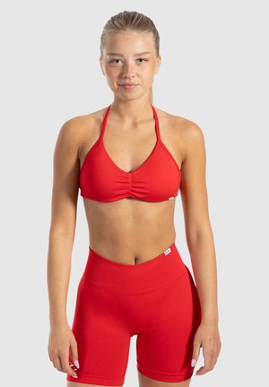 ESTA HALTERNECK YOGA PILATES - Light support sports bra - rot