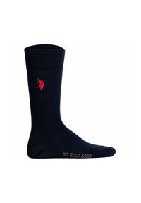 Calzino in cotone blu navy con polsino a coste, dotato di logo ricamato rosso e testo "U.S. POLO ASSN." sulla parte del piede. Design classico e texture liscia.