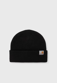 Zwarte gebreide beanie met een omgeslagen boord. Gemaakt van zachte stof, met een klein Carhartt logo label in oranje en wit aan de zijkant.