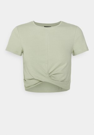 Lichtgroen cropped T-shirt met korte mouwen en een gedraaide knoopdetail aan de voorkant in het midden.