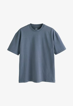 Lühikeste varrukatega, ümarama kaelusega T-särk pehmes sinises värvitoonis, valmistatud pehmest puuvillakangast, millel on sile tekstuur ja mugav lõige.