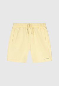 Gele katoenen shorts met een elastische tailleband, trekkoord en zijzakken. Kenmerkt zich door een klein "HANG ELEVEN" logo op de zoom.