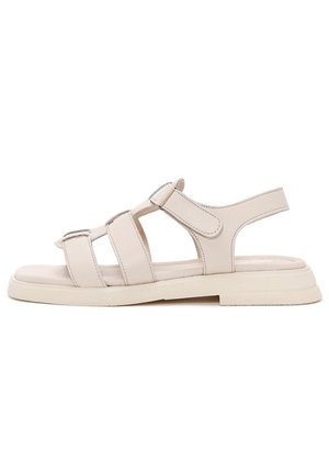 Beige offene Sandale mit drei verstellbaren Riemen und einer gepolsterten Sohle, entworfen für Komfort und den Freizeitgebrauch.