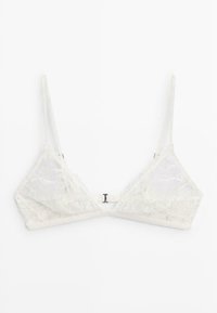 Hvid blonder bralette med tynde justerbare stropper og frontlukning på en ensfarvet hvid baggrund.