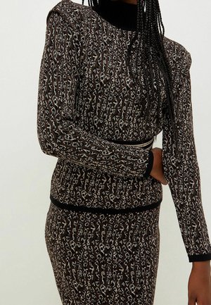 Stickad tröja - mottled dark brown