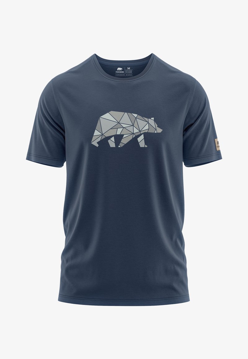 Camiseta de manga corta en azul marino, fabricada con un tejido suave, que presenta un diseño geométrico de un oso en gris claro en la parte frontal. Parche de logo en la manga.