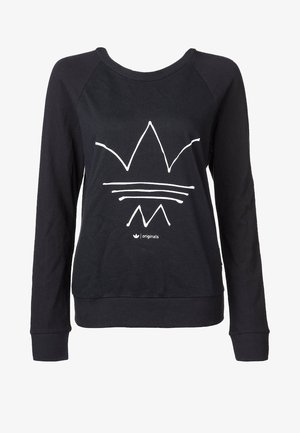 Mustat hupparit, joissa on valkoinen graafinen suunnittelu kruunusta ja vuoresta. Pitkät hihat, pyöreä kaula-aukko, ribbitut hihat ja helma.