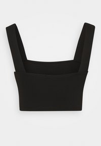 Bralette negra con tirantes anchos, textura suave y diseño ajustado. Confeccionado con material elástico para mayor comodidad y soporte.