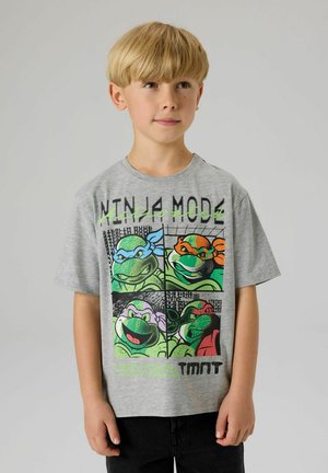 Gray cotton t-shirt featuring four colored cartoon turtles in squares, with "Ninja Mode" text at the top and "TMNT" at the bottom.
