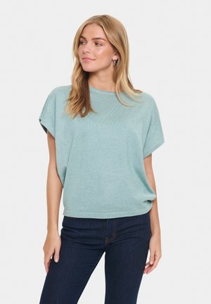 Top corto maniche corte in un fresco colore verde acqua, con una vestibilità comoda, realizzato in tessuto morbido. Presenta un collo rotondo e un orlo leggermente curvato.