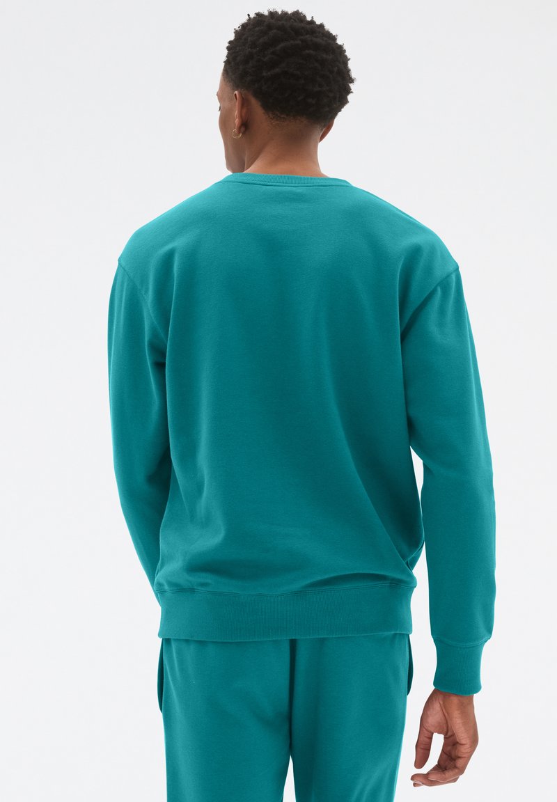 New Balance FRENCH TERRY CREWNECK UNISEX - Sweatshirt - vintage teal  (317)/vert foncé - ZALANDO.FR