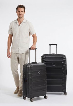 Delsey Paris, METEOR 4 ROLLEN KOFFERSET 2-TEILIG MIT DEHNFALTE UNISEX - Set de valises - deep black