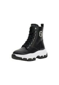 Stivaletto in pelle nera con soletta bianca, punta tonda, lacci frontali e una toppa decorativa con strass sul lato.