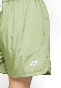 Nike Sportswear M NSW SPE WVN LND FLOW SHORT - Calças de fato de treino - alligator