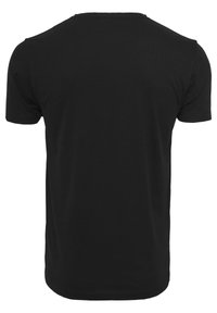 T-shirt noir à manches courtes avec un col rond. Fabriqué en tissu doux, avec une texture lisse et une coupe standard.