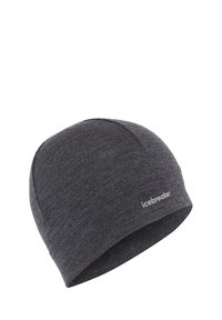 Szary beanie z miękkiego materiału. Blisko przylegający fason, gładka tekstura, z małym przeszytym logo "icebreaker" z boku.