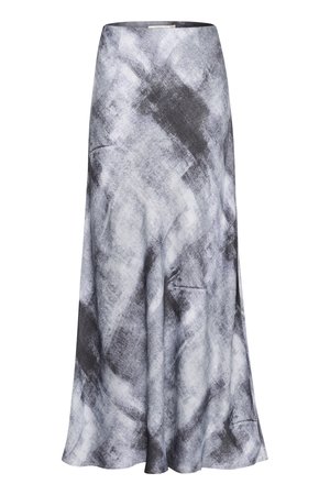Jupe longue et fluide en tissu doux, présentant un motif abstrait dans des nuances de gris et de noir. L'ourlet est légèrement évasé pour faciliter le mouvement.
