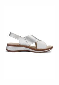 Silver and white leather wedge sandal with open toe, slingback strap, cushioned sole, and textured brown outsole.
