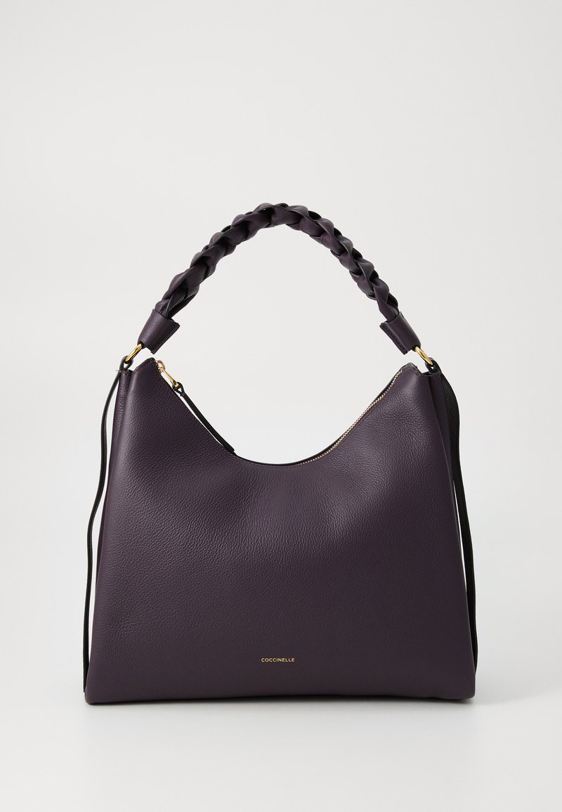Purple leather hobo bag with a textured finish, featuring a braided handle, gold hardware, and a zip closure along the top edge.