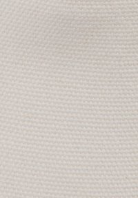 Κοντινό πλάνο από απαλή, ανοιχτό μπεζ υφαντή υφή με διακριτικό οριζόντιο ανάγλυφο μοτίβο.