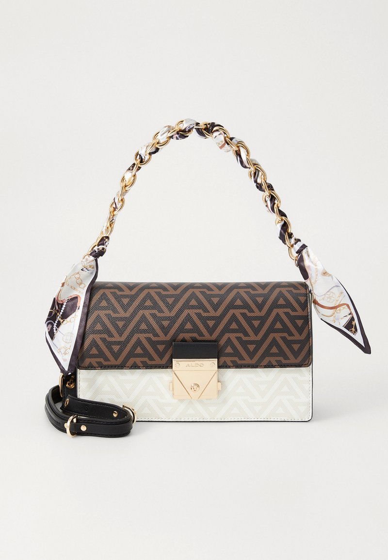 Handbag featuring a geometric brown and cream pattern, gold hardware, a fabric scarf accent on the strap, and a removable shoulder strap.