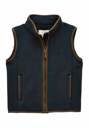 Marineblauwe mouwloze fleecevest met bruine afwerking, ritssluiting aan de voorkant, twee zijzakken en een opstaande kraag.