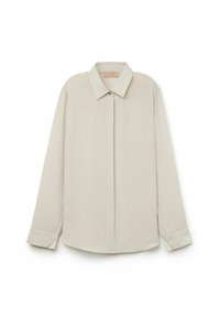 Helles beigefarbenes Langarmshirt, aus weichem Stoff, mit klassischem Kragen, knopflosem Verschluss vorne und abgerundetem Saum, mit minimalen Details.