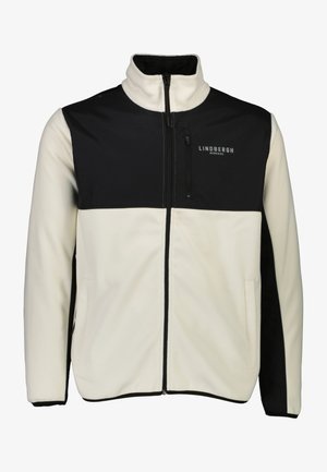 Fleece takki, jossa on vetskarilla suljettava etuosa, korkea kaulus ja kaksivärinen muotoilu mustassa ja kermanvärisessä. Sisältää sivutaskut ja brändäysyksityiskohdat.