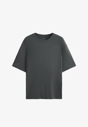 T-shirt oversize grigio scuro, maniche corte, scollatura rotonda, realizzato in morbido tessuto di cotone, presenta una superficie leggermente texture.