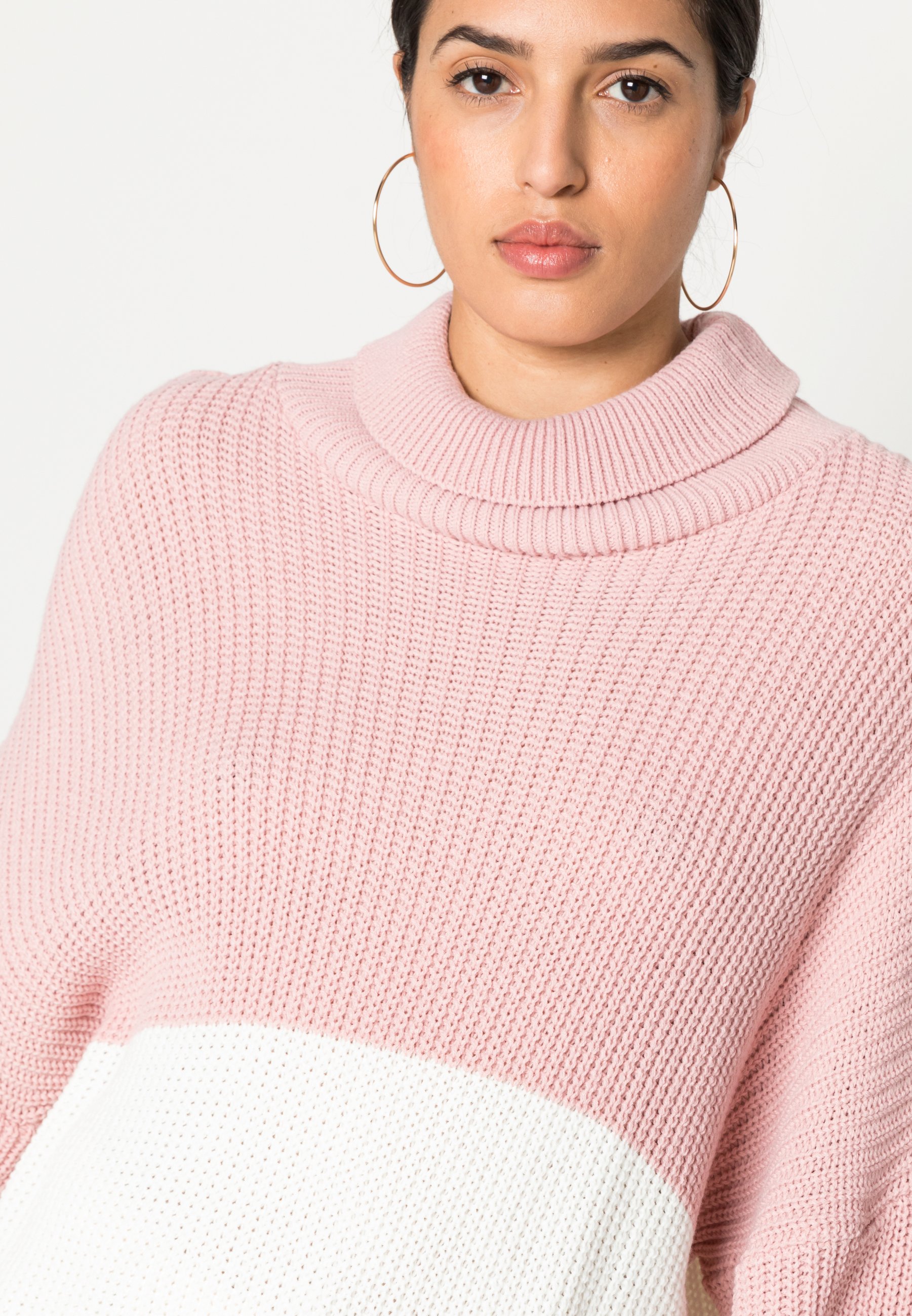 nude roll neck jumper
