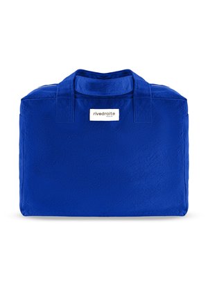 Sac fourre-tout en tissu bleu vif avec deux anses et une étiquette blanche portant l'inscription « rivedroite Paris » centrée sous les anses.