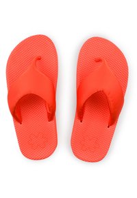 Red flip-flops with textured soles and rubber straps. The straps have a smooth finish and a distinctive design at the toe post.