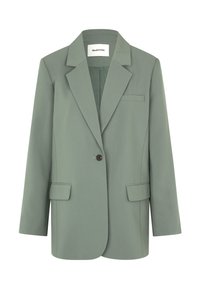 Lys grønn blazer med en enkelt knappelukking, hakket krage, en brystlomme og to frontlommer. Laget av et glatt stoff.