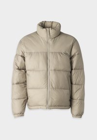 Tan puffer jacket with a high collar, zip front closure, and elasticized cuffs. Features quilted texture and boxy design.