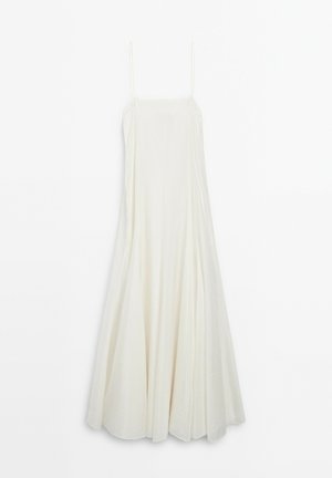 Hvid, ærmeløs kjole med tynde stropper, løs pasform og en svagende nederdel. Stof ser let og glat ud med et minimalistisk design.