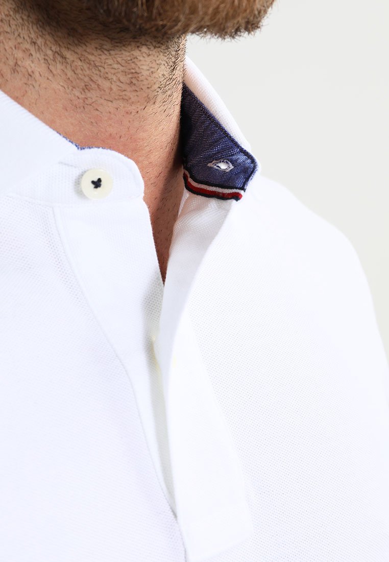 Tommy Hilfiger PERFORMANCE SLIM FIT - Polo shirt - white - Zalando.co.uk