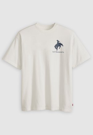 White cotton T-shirt with short sleeves, featuring a dark blue outline graphic of a cowboy on a bucking horse and text "Levi Strauss & Co."